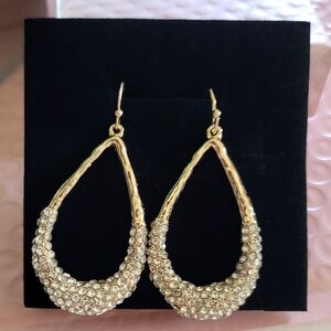 Gold teardrop shaped earrings with cubic zirconia embellishment